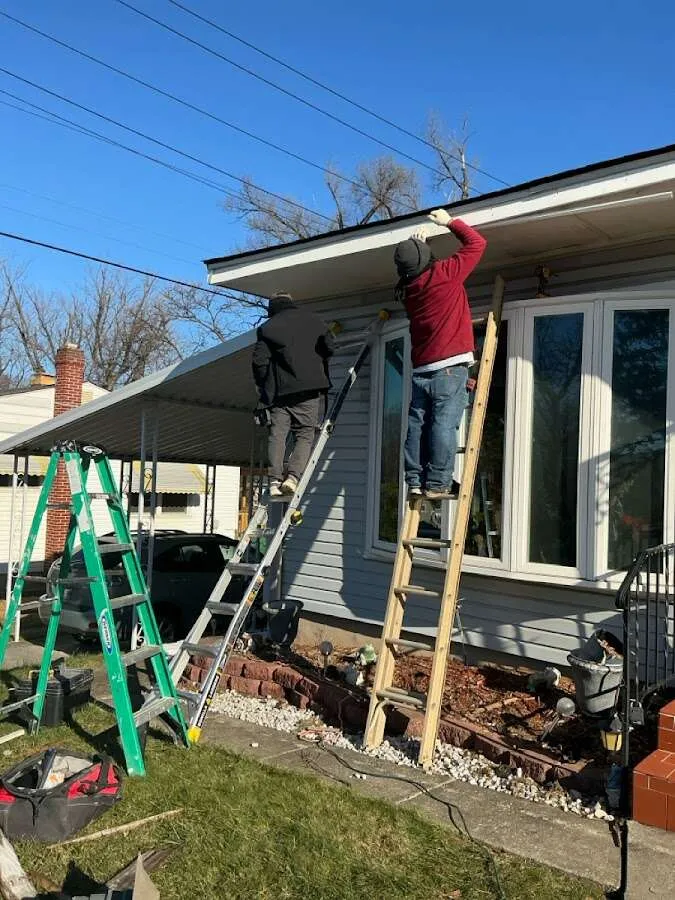 Restoration crew performing exterior repair in Carroll